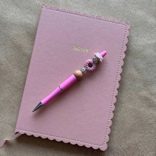 Stylo bille noir perle marguerite rose