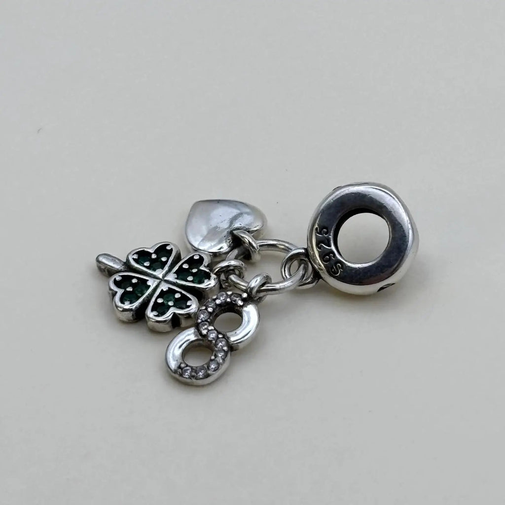 Charms Pand'OR avec trois breloques en forme de cœur trèfle et infini en argent Sterling 925 