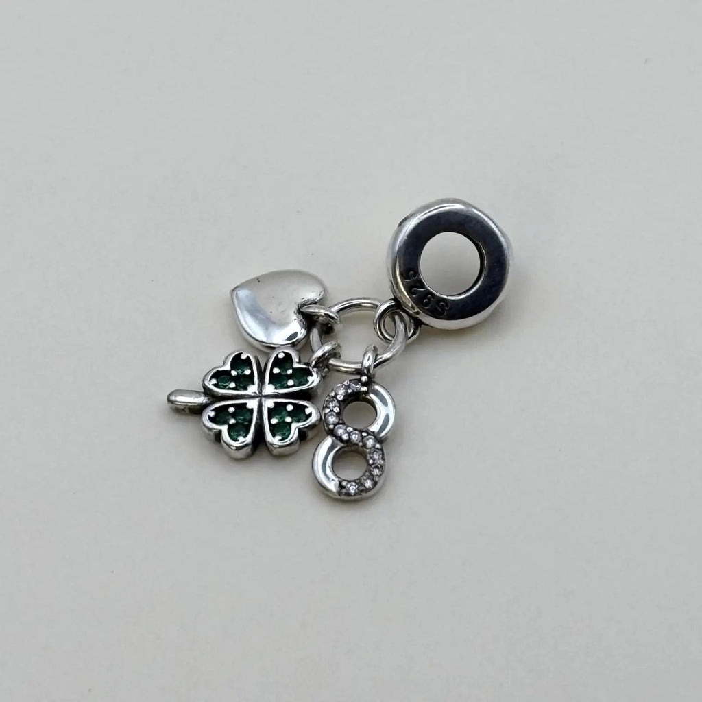 Charms Pand'OR argenté avec trois breloques en forme de cœur trèfle et infini en argent Sterling 925 