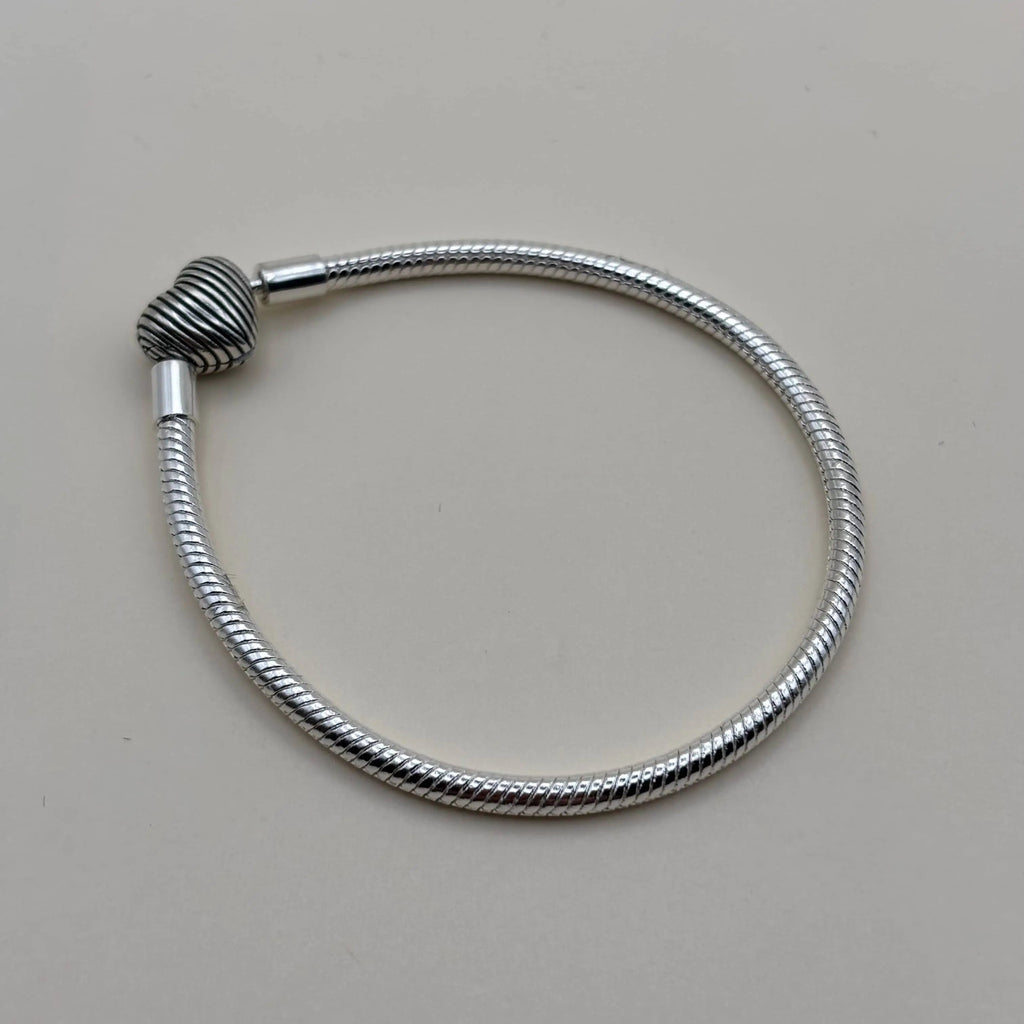 Bracelet Pand'Or avec charm en forme de cœur  en acier inoxydable