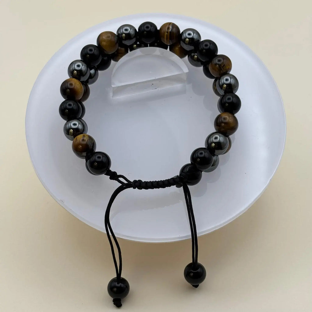 Bracelet pour homme en double rang avec des perles œil de tigre hématite et obsidienne noire sur in lien réglable noir