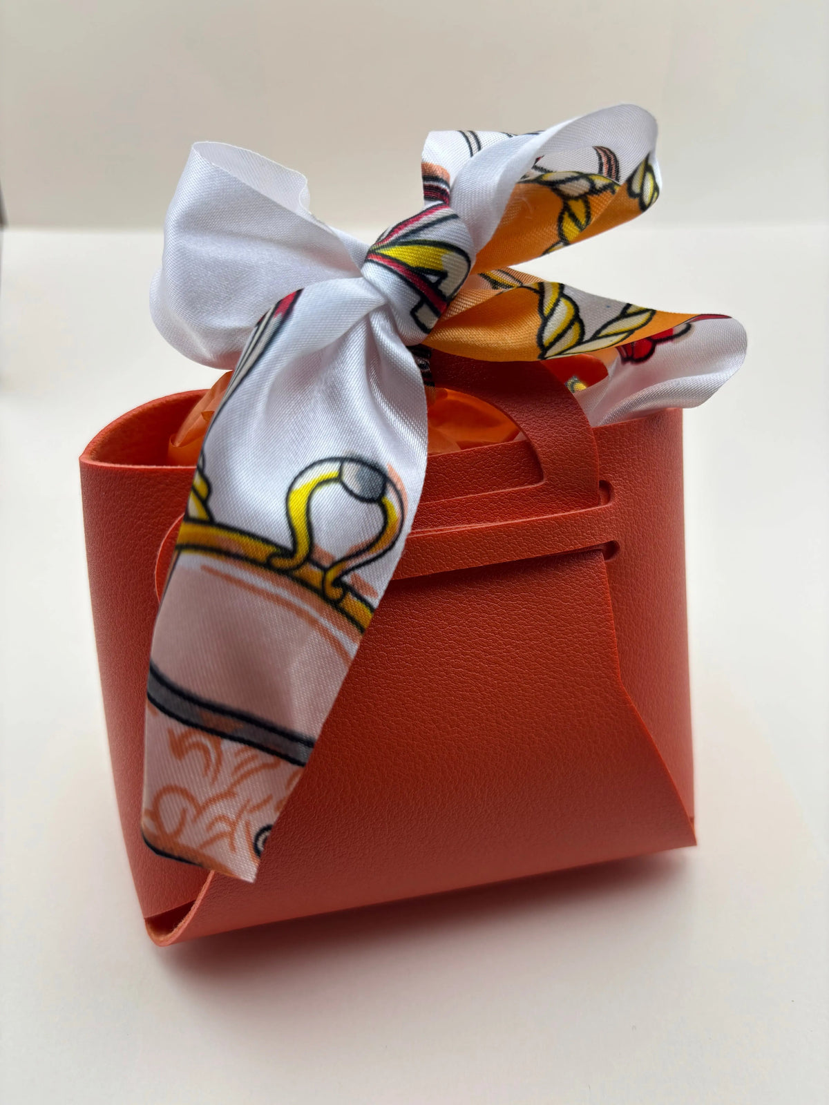 Emballage en forme de sac à main orange en simili cuir