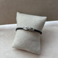 Bracelet argenté homme | Câble tressé noir acier inoxydable | Détail rose des vents
