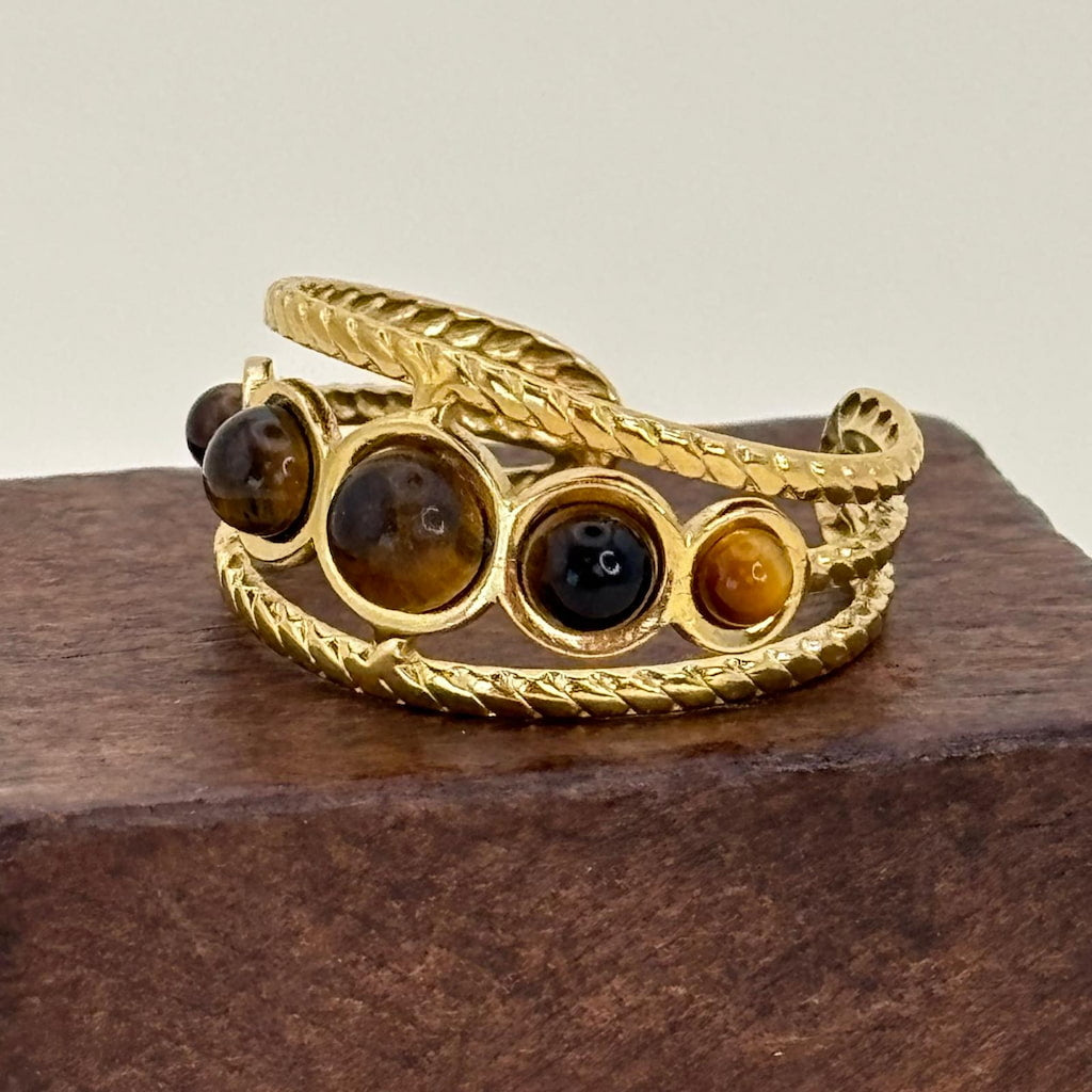 Bague dorée ajustable avec des pierres de couleur ambrées