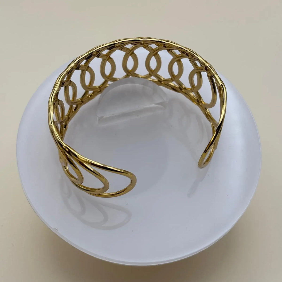 Bracelet doré à jonc ouvert avec motif en forme de cercles en acier Inoxydable 