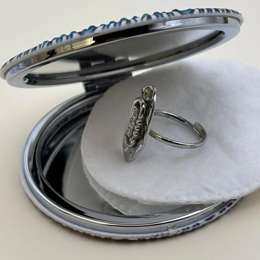 Bague argentée ajustable ovale avec trois brillants alignés