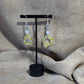 Boucles d'oreilles - pendentif
Perles acryliques de 4 mm
Perle acier fleur