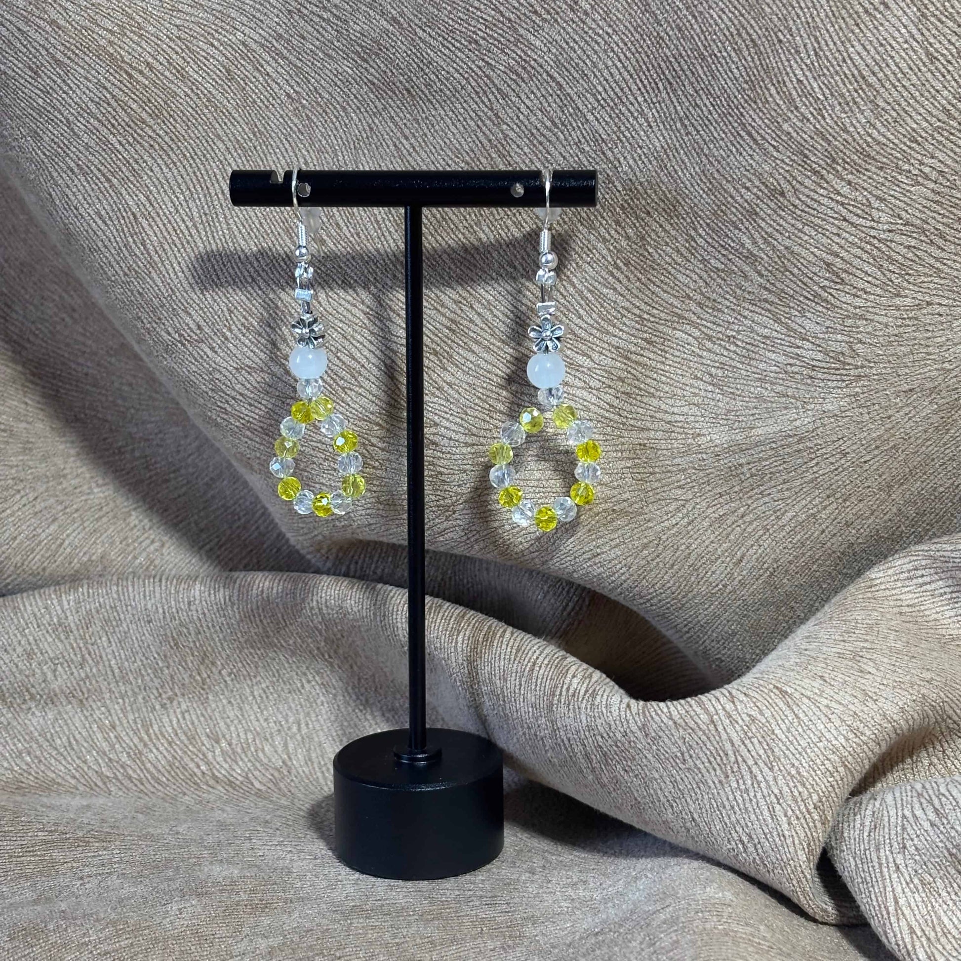 Boucles d'oreilles - pendentif
Perles acryliques de 4 mm
Perle acier fleur