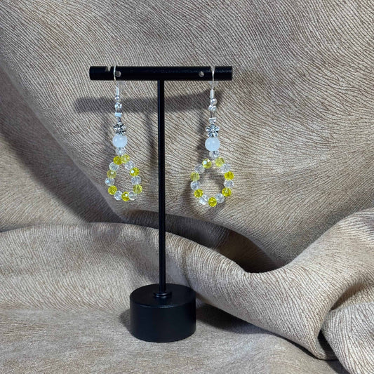 Boucles d'oreilles - pendentif
Perles acryliques de 4 mm
Perle acier fleur