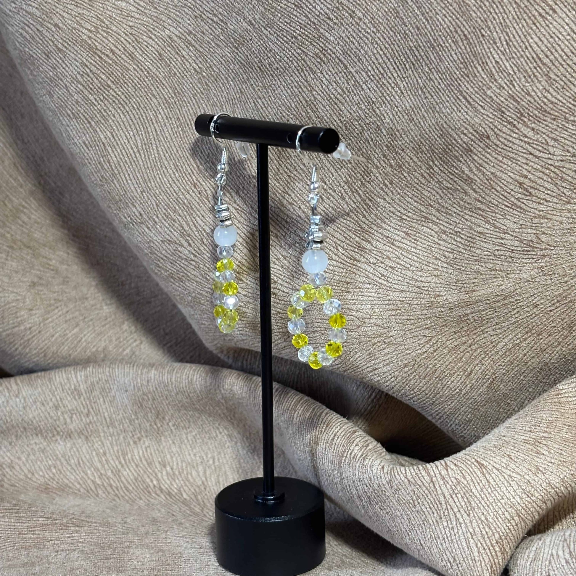 Boucles d'oreilles - pendentif
Perles acryliques et perle acier en forme de cercle