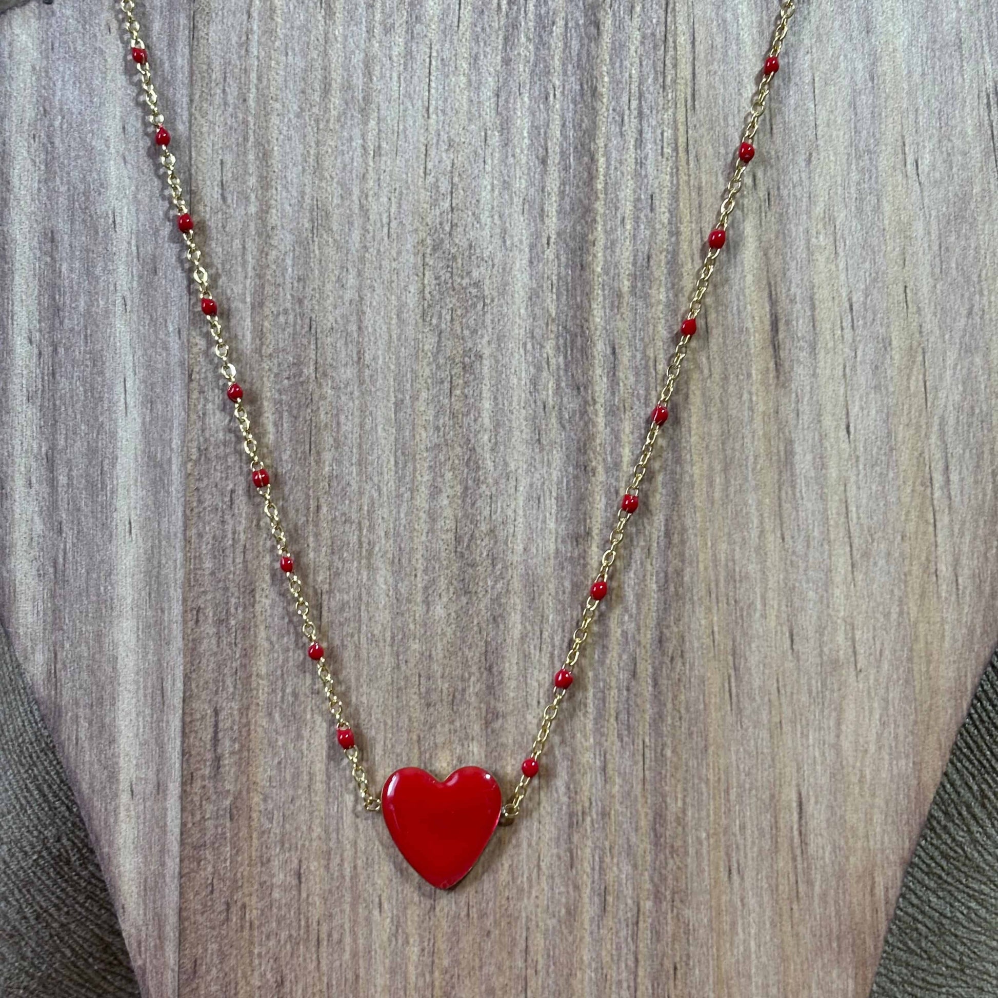Parure collier - bracelet et boucles d'oreilles
Pendentif cœur coloré rouge