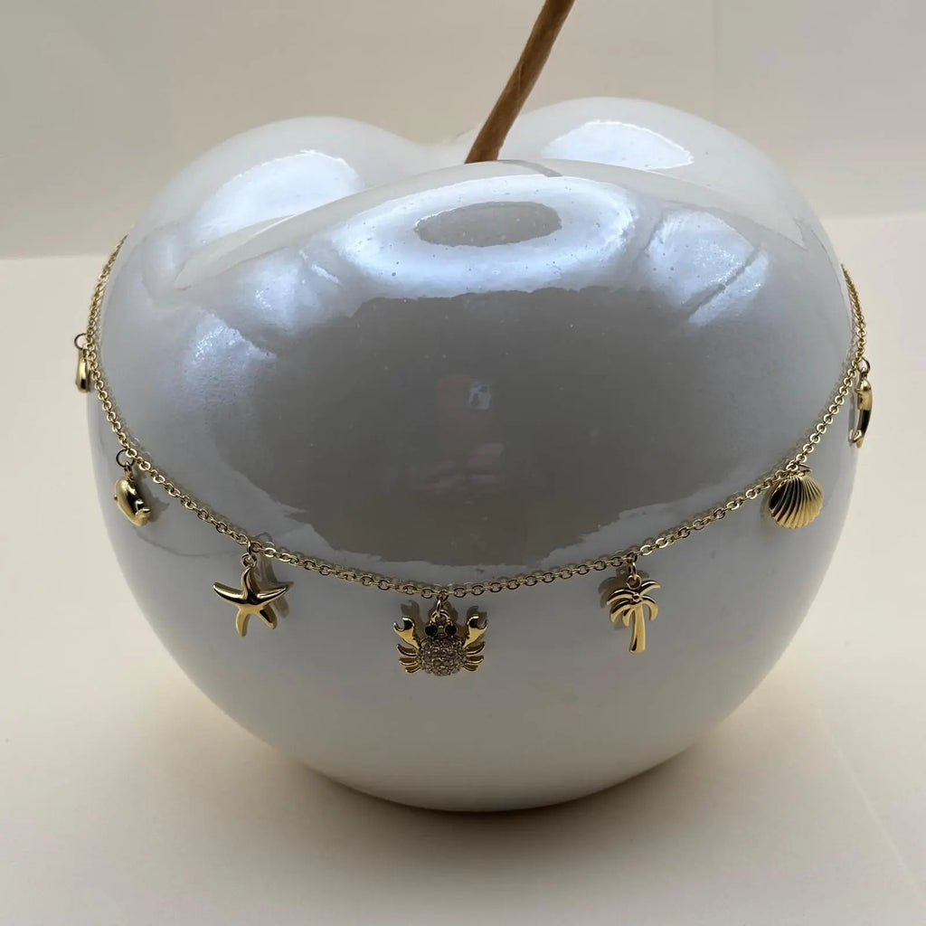 Collier de couleur dorée avec breloques coquillage palmier crabe étoile de mer et baleine en acier inoxydable