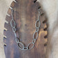 Collier argenté |Anneaux ovales lisses et torsades | Acier inoxydable