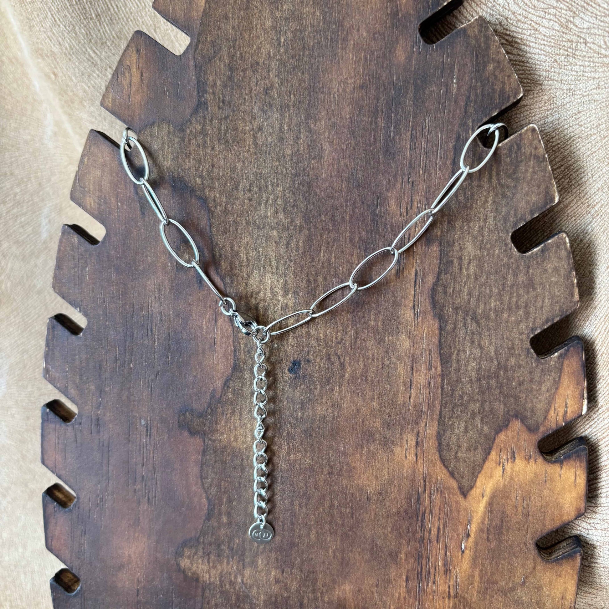 Collier argenté |Anneaux ovales lisses et torsades vue de l'arrière | Acier inoxydable
