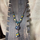 Collier fantaisie ethnique | lien en nylon marron réglable avec perles céramique et médaillon | bleu canard