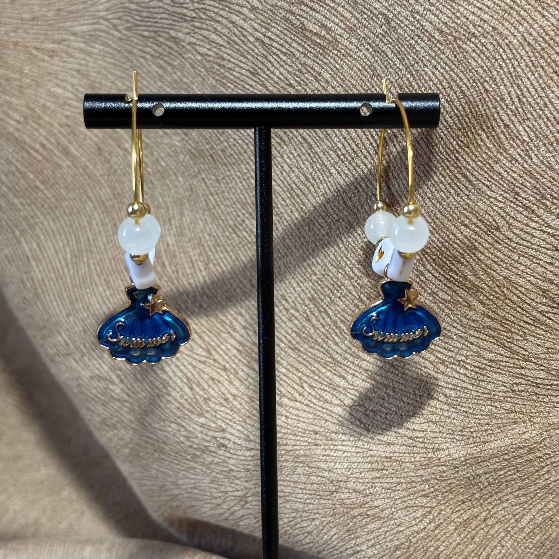 Boucles d'oreilles - créole breloque coquillage "summer" bleu
Perles cœurs 