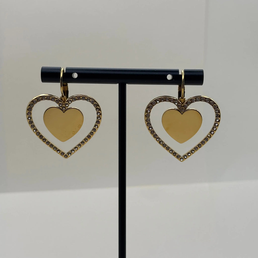Boucles d'oreilles dorées avec motif double cœur entouré de strass en acier inoxydable