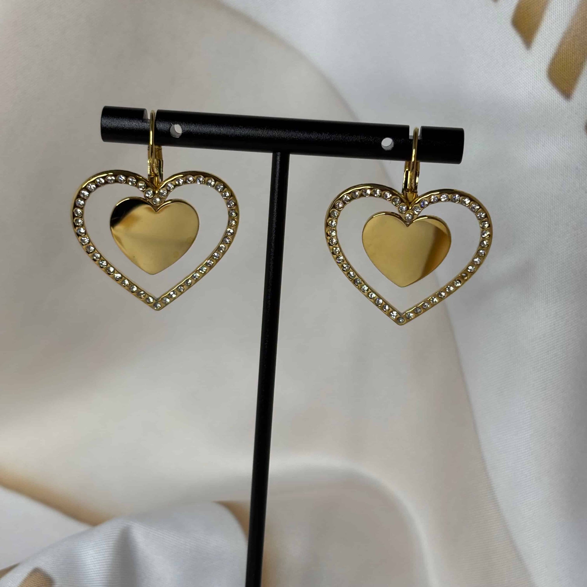 Boucles d'oreilles |Motif double cœur entouré de strass | Or | Acier inoxydable