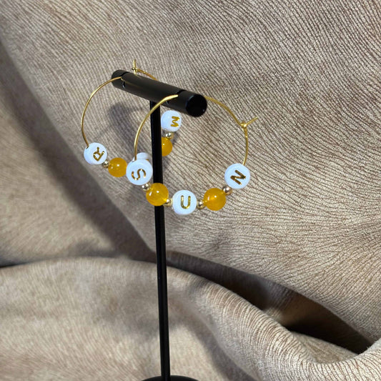 Boucles d'oreilles créoles avec le mot mer