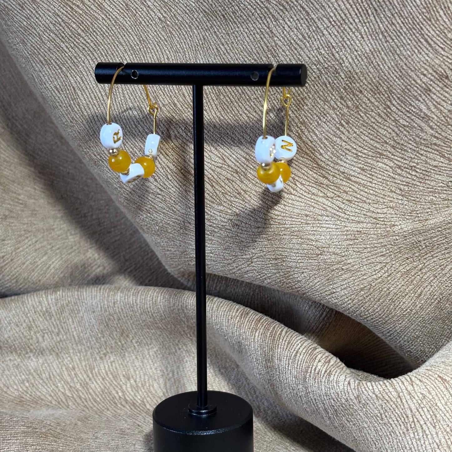 Boucles d'oreilles créoles avec le mot mer