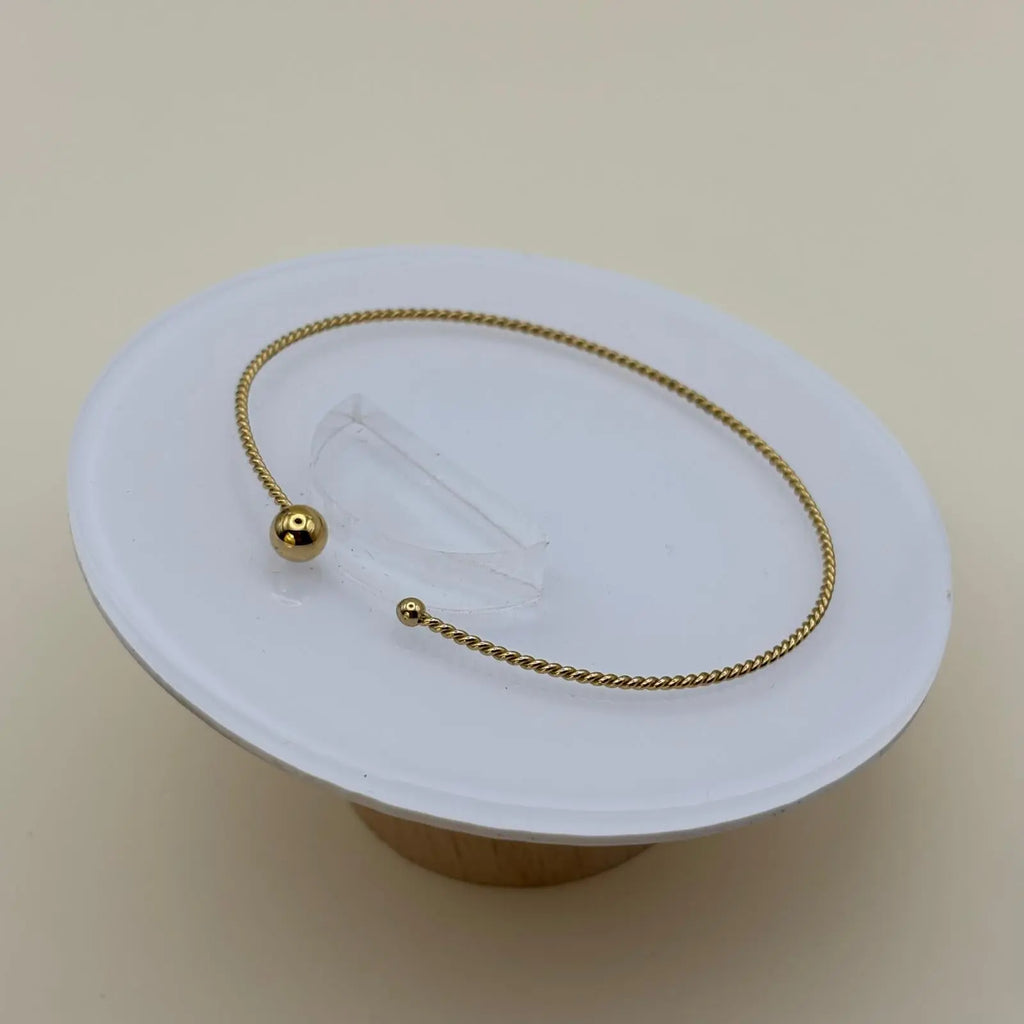 Bracelet doré semi-rigide en acier inoxydable