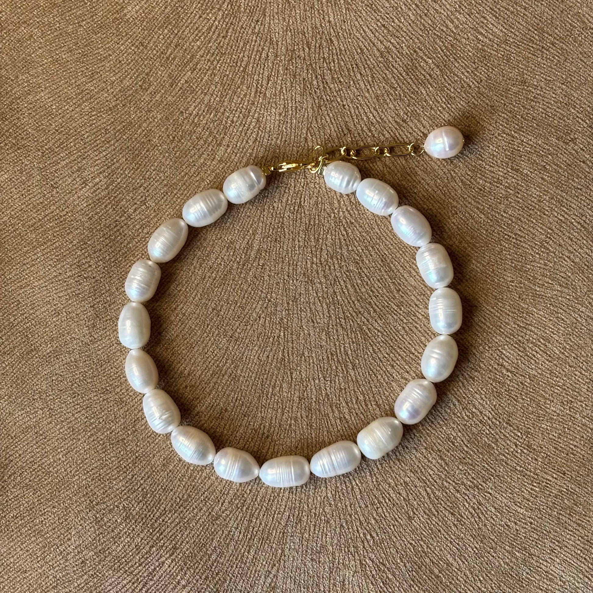 Bracelet de cheville
Perles d'eau douce blanche