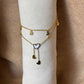 Bracelet de cheville
Chainette dorée
Breloques coeur