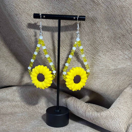Boucles d'oreilles - pendentif marguerite jaune de 3 cm
Perles acryliques de 4 mm