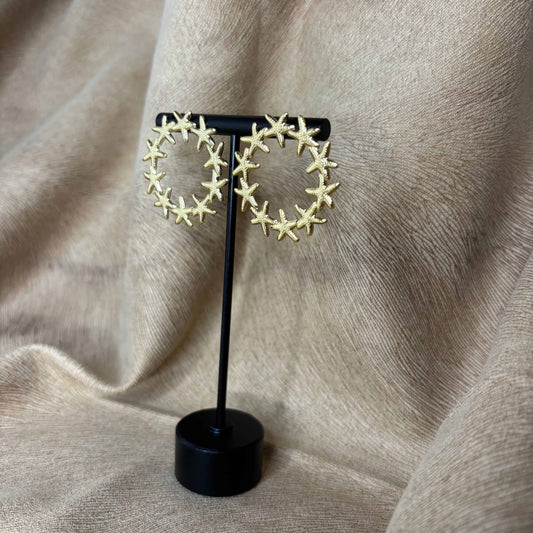 Boucles d'oreilles dorées | Etoile de mer en cercle | Acier inoxydable