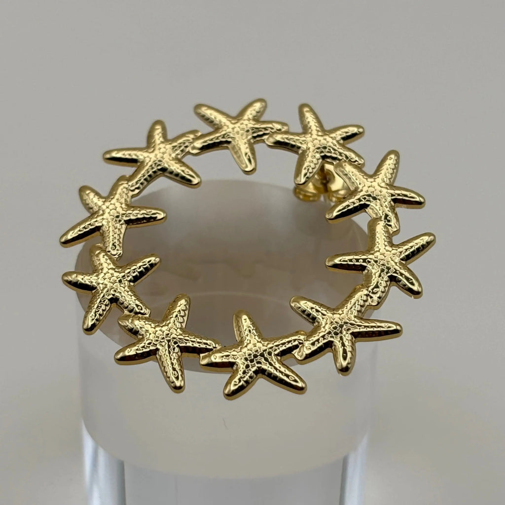 Boucles d'oreilles dorées ornées d'étoile de mer en cercle en acier inoxydable