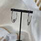 Boucles d'oreilles créoles Motif en cœur couleur argent | Acier inoxydable