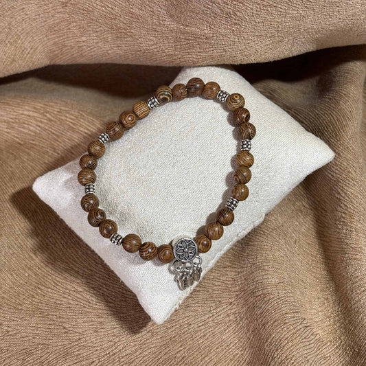 Bracelet en perles artisanal | Bracelet avec breloque attrape-rêve | Perles en bois sur élastique