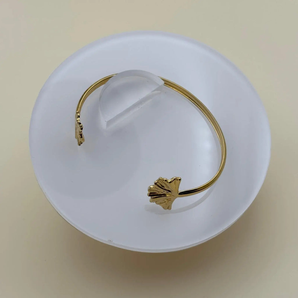 Bracelet doré rigide avec motifs feuille en acier inoxydable