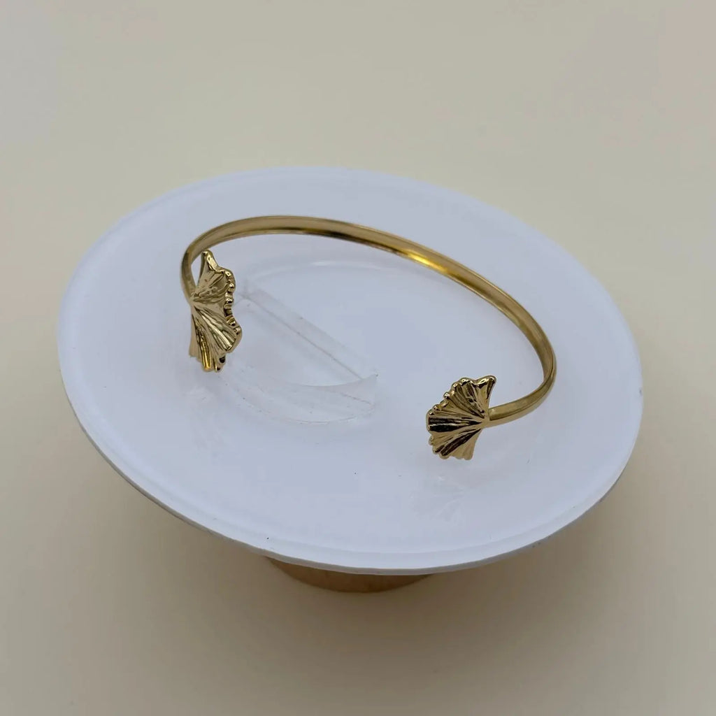 Bracelet de couleur dorée rigide avec motifs feuille en acier inoxydable